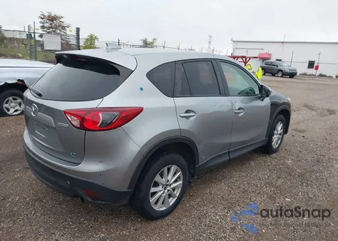 2014 Mazda Cx-5 Touring z USA, uszkodzony, nr VIN JM3KE4CY9E0366685